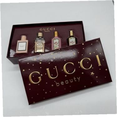 Gucci Mini Set    Edp Bloom 5 ml + Edp Flora Gorgeous Gardenia 5 ml + Edp Flora Gorgeous Gardenia Intense 5 ml + Edt Guilty Pour Femme 5 ml Eau de Toilette  5ml(Eau de Parfum) für Frauen
